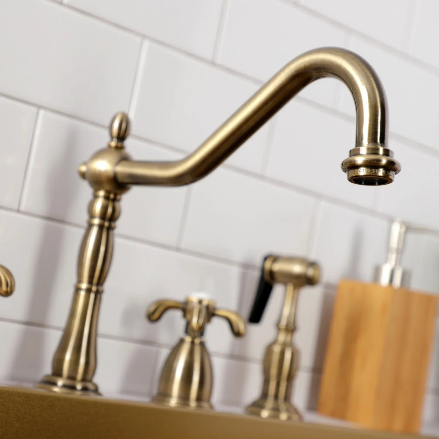 Kingston Brass French Country Double-Handle Widespread Kitchen Faucet with Brass Sprayer, Antique Brass (KB1793TXBS) - Image 4