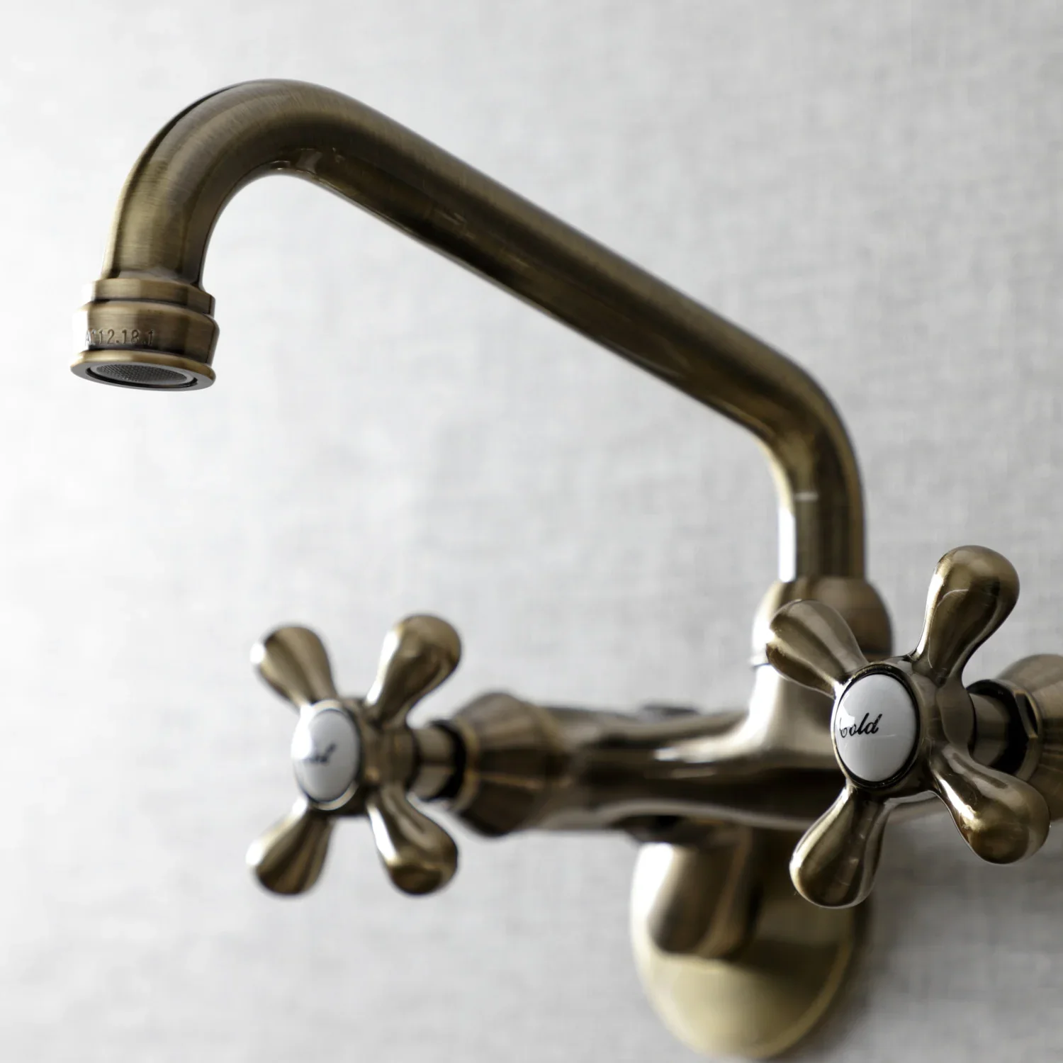 Kingston Brass Kingston Double-Handle Wall-Mount Bridge Kitchen Faucet, Antique Brass (KS213AB) - Image 3