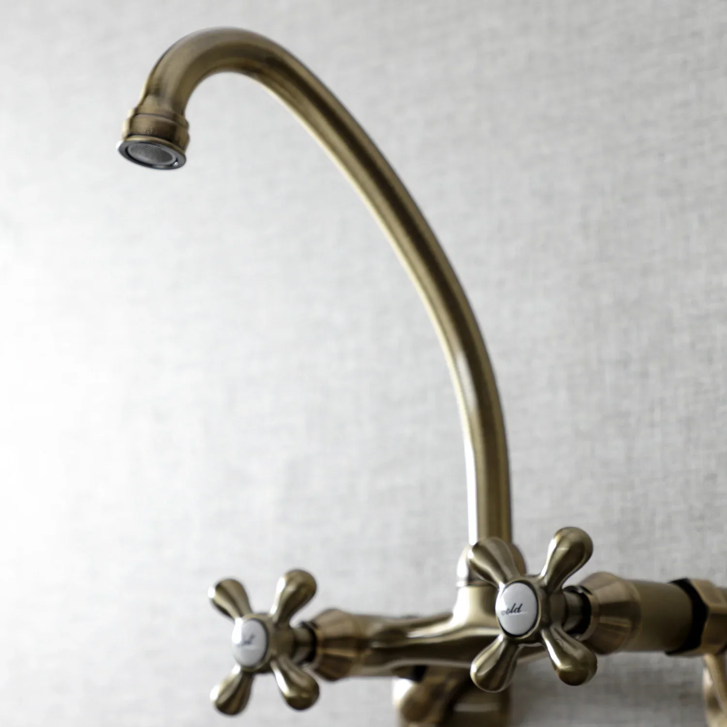 Kingston Brass Kingston Double-Handle Wall-Mount Bridge Kitchen Faucet, Antique Brass (KS214AB) - Image 2