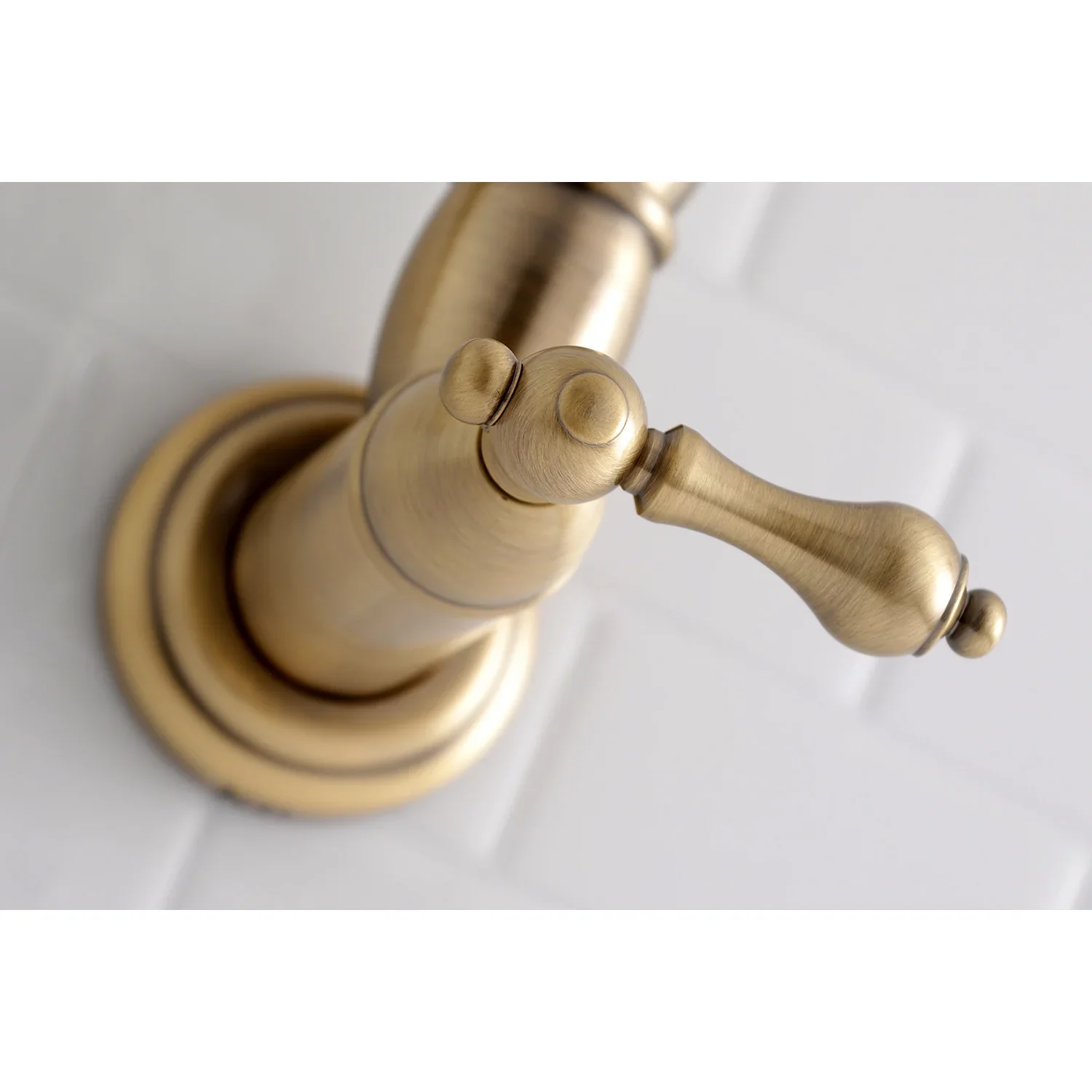 Kingston Brass Restoration Wall Mount Pot Filler Faucet, Antique Brass (KS3103AL) - Image 5