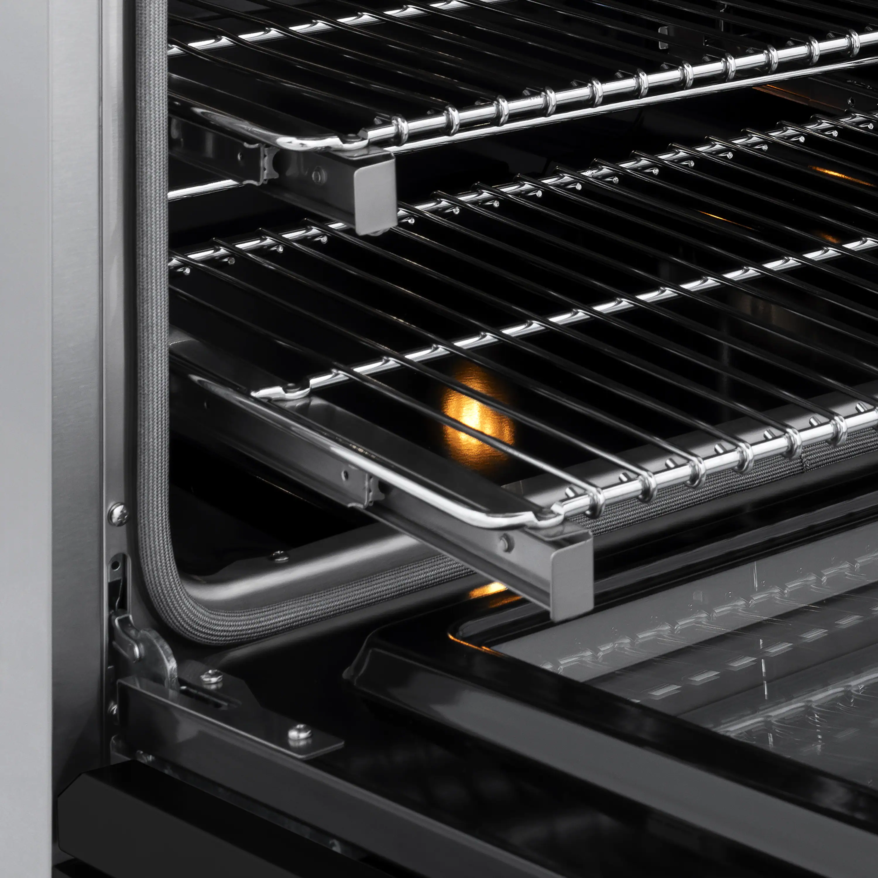 ZLINE Autograph Edition 36-Inch 5.2 cu. ft. Paramount Induction Range with 5 Element Cooktop and Electric Convection Oven in Stainless Steel with Black Matte Door and Champagne Bronze Accents (SINRZ-BLM-36-CB) - Image 8